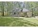Attached two-car garage with abundant parking on a private lot with mature trees at 110 Greenridge Ct, Fayetteville, GA 30215
