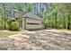 Attached two-car garage with abundant parking on a private lot with mature trees at 110 Greenridge Ct, Fayetteville, GA 30215