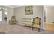 Cozy living room featuring classic furniture, soft lighting, and access to adjoining rooms at 110 Greenridge Ct, Fayetteville, GA 30215