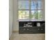 Neutral room with storage drawers under a window with view of lush trees at 110 Greenridge Ct, Fayetteville, GA 30215