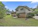 Back of a two story home with a brick facade and vinyl siding at 269 Malone Cir, Fairburn, GA 30213