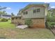 Back of a two story home with a brick facade and vinyl siding at 269 Malone Cir, Fairburn, GA 30213