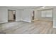 Spacious living room with new flooring, fresh paint, and an open layout for easy entertaining at 269 Malone Cir, Fairburn, GA 30213