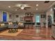 Open-concept living room with a cozy fireplace and hardwood floors at 678 Oak Grove Rd, Mcdonough, GA 30253
