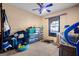 Bedroom with a ceiling fan and large window provides natural light at 812 Bartow Ct, Riverdale, GA 30274