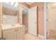 Bathroom featuring a vanity with a sink and view into an adjacent bedroom at 140 Campaign Trl, Fayetteville, GA 30214