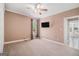 Bedroom with natural light, neutral walls, and hardwood floors near the door at 140 Campaign Trl, Fayetteville, GA 30214