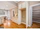 Kitchen area boasts custom cabinetry and hardwood floors at 140 Campaign Trl, Fayetteville, GA 30214