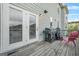 Cozy back deck with a grill and outdoor seating, ideal for relaxing or entertaining guests at 130 Sycamore Row, South Fulton, GA 30331