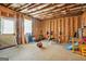 Unfinished basement offering workout equipment and ample room for recreation at 130 Sycamore Row, South Fulton, GA 30331