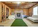 Spacious unfinished basement featuring a golf simulator and ample room for recreation at 130 Sycamore Row, South Fulton, GA 30331