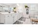 Bright bathroom showcasing dual vanities, decorative accents, and a modern aesthetic at 130 Sycamore Row, South Fulton, GA 30331