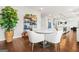 Charming breakfast nook adjacent to the kitchen featuring a round table, seating, and stylish decor at 130 Sycamore Row, South Fulton, GA 30331