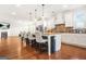 Bright, open kitchen boasts granite countertops, a large island, and stainless steel appliances at 130 Sycamore Row, South Fulton, GA 30331