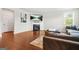 Comfortable living room featuring a fireplace and lots of natural light at 130 Sycamore Row, South Fulton, GA 30331