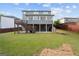 Backyard with a deck, patio and lush lawn perfect for outdoor entertaining and relaxing at 1953 Azure Grove Ct, Marietta, GA 30008