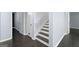 Basement area with stairs and wood floors leads to other rooms and more space at 1953 Azure Grove Ct, Marietta, GA 30008
