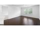 Spacious bedroom featuring hardwood floors and windows for natural light at 1953 Azure Grove Ct, Marietta, GA 30008