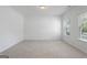Bright bedroom with neutral carpet and lots of natural light at 1953 Azure Grove Ct, Marietta, GA 30008