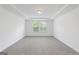 The bedroom has neutral-colored carpet and tray ceilings at 1953 Azure Grove Ct, Marietta, GA 30008