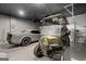 Spacious garage featuring a car, golf cart and ample storage provides convenience and style at 1953 Azure Grove Ct, Marietta, GA 30008