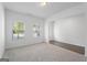 Bright living room features neutral carpet and lots of natural light at 1953 Azure Grove Ct, Marietta, GA 30008