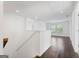 Bright loft area features hardwood floors, neutral paint and plenty of natural light from the double windows at 1953 Azure Grove Ct, Marietta, GA 30008