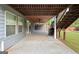 Covered patio with stairs to a backyard is perfect for outdoor gatherings and relaxation at 1953 Azure Grove Ct, Marietta, GA 30008