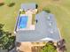 Overhead shot of a home with a backyard pool, detached garage, and beautifully landscaped surroundings at 421 Hampton Rd, Fayetteville, GA 30215