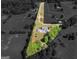 Aerial view of a property showcasing a home with a private pool, surrounded by lush greenery at 421 Hampton Rd, Fayetteville, GA 30215