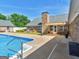 Backyard oasis with a sparkling pool, patio, and pergola, perfect for outdoor relaxation and entertaining at 421 Hampton Rd, Fayetteville, GA 30215
