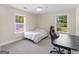 Bedroom with a bed, desk, ceiling fan, and window overlooking a pool at 421 Hampton Rd, Fayetteville, GA 30215