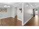 Spacious dining room featuring pristine hardwood floors, chandelier, and elegant trim at 421 Hampton Rd, Fayetteville, GA 30215