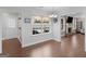 The dining room offers views to the back yard pool and a living area with a brick fireplace at 421 Hampton Rd, Fayetteville, GA 30215