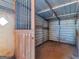 Spacious horse stall with metal bars, wooden accents, and ample room for horses and livestock at 421 Hampton Rd, Fayetteville, GA 30215