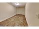 Unfinished basement space with stained concrete flooring, neutral walls, and ceiling light at 143 Tara Blvd, Loganville, GA 30052