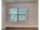 Bedroom with carpet and window showing natural light at 143 Tara Blvd, Loganville, GA 30052