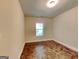 Cozy bedroom with natural light from window and stained concrete floors at 143 Tara Blvd, Loganville, GA 30052
