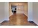 Elegant dining room with hardwood floors, wainscoting, and a classic chandelier at 143 Tara Blvd, Loganville, GA 30052