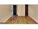 Hallway with stained concrete floors, doors, and neutral wall paint at 143 Tara Blvd, Loganville, GA 30052