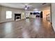 Spacious living room featuring a fireplace, hardwood floors, and an open floor plan at 143 Tara Blvd, Loganville, GA 30052