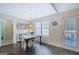 Bright dining area with a view of the backyard and stylish table and chairs at 103 Fuller Ct, Grantville, GA 30220