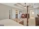 Large main bedroom with a seating area, walk-in closet, and en-suite bathroom at 103 Fuller Ct, Grantville, GA 30220