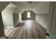 Spacious room with a window and sloping ceilings at 716 Wilkes Dr, Loganville, GA 30052