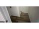 Hallway featuring modern flooring and a door at 716 Wilkes Dr, Loganville, GA 30052