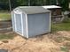 Convenient outdoor storage shed provides ample space for gardening equipment and outdoor gear at 716 Wilkes Dr, Loganville, GA 30052
