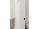 Bathroom entrance featuring a white door and a glimpse of the toilet and shower area at 3229 Broadnax Mill Rd # 4, Loganville, GA 30052