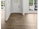 Bright foyer showcasing hardwood floors, white trim, and a view of the front door and windows at 3229 Broadnax Mill Rd # 4, Loganville, GA 30052