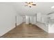 Open-concept living area featuring wood floors and modern design with seamless transition to other rooms at 3229 Broadnax Mill Rd # 4, Loganville, GA 30052