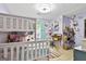 Charming room with bunk beds, a desk, and a variety of decorations for a playful ambiance at 215 Calgary Dr., Peachtree City, GA 30269